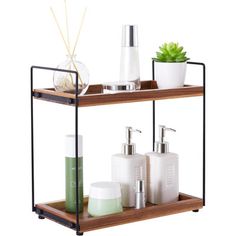 three tiered shelf with soap, lotion and toothbrushes on it in front of a white background