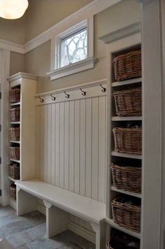 a room with some shelves and baskets on the wall next to it is an instagram page