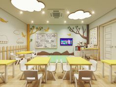 a classroom with yellow tables and white chairs