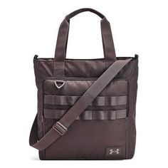 the under armour tote bag is brown and has two zippers on each side