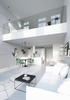 a living room filled with white furniture and lots of windows