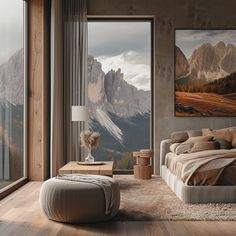 a bedroom with mountains in the background and a large window on the wall above it