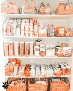 an open refrigerator filled with lots of food and storage containers on top of white shelves