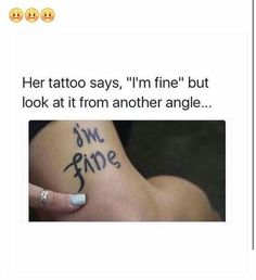 a woman with her tattoo saying i'm fine but look at it from another angle