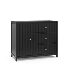 a black cabinet with three drawers and two gold knobs on the front, against a white background