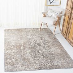 This Beige Madison Abstract Area Rug offers a mix of modern and vintage designs. Its warm, neutral tones easily complement a wide variety of decor styles! Rug measures 8 ft. in length x 10 ft. in height Crafted of polypropylene, cotton, and polyester Power loomed construction Abstract pattern Hues of tan, white, and gray Rug pad not included Care: Vacuum regularly. Blot spills with a mild detergent and clean cloth. Not safe for outdoor use. This item is available at Kirklands.com only, not available in stores. Please note: this item cannot be shipped to APO/FPO addresses. | Madison Abstract Area Rug, 8x10, Tan, 8x10 , Polypropylene/Cotton/Polyester | Kirkland's Home Townhome Living Room, Great Room Ideas, Mod Decor, Beige Color Palette, Lake Shore Drive, Bedroom Cozy, Coastal House, Industrial Area Rugs, Lake Shore