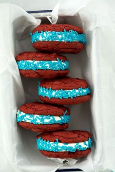 red, white and blue cookies with frosting on them