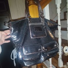 I Have A Silver/Chrome Color Sequin Coach Poppy Bag In Excellent Condition, Barely Used. Any Redish Color In Photos Is Only A Reflection From My Light . It Has A Lot Of Room And A Lot Of Pockets, It Is A Light Purple Color Inside. It Is A Nice Size Bag As You Can See From The Picture With My Hand In It. The Silver Buttons On The Front Pockets,Have The Word Coach On Them As Well. These Bags A Quite Hard To Find In Great Condition And I've Seen Some Pretty Expensive Ones, But I Was Lucky Enough To Designer Silver Bag With Detachable Strap, Silver Tote Shoulder Bag With Detachable Strap, Silver Shoulder Bag With Removable Pouch And Double Handle, Silver Designer Bag With Double Handle, Designer Silver Shoulder Bag With Double Handle, Silver Double Handle Bag With Palladium Hardware, Designer Silver Bags With Silver-tone Hardware, Silver Bag With Detachable Strap And Double Handle, Silver Bags For Everyday Use