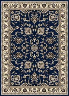 a blue rug with an ornate design on the bottom and beige trimming around it