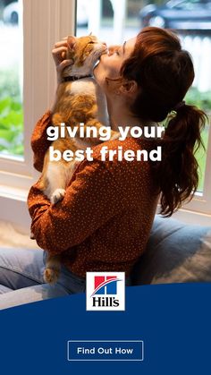 a woman holding a cat in her arms with the caption giving your best friend