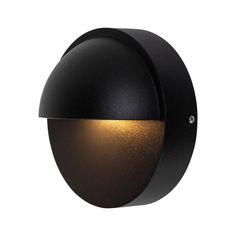 an outdoor light that is black and has gold highlights on the outside side of it