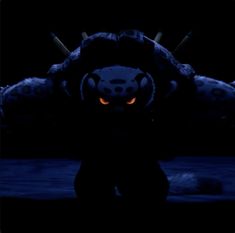 an animated character with glowing eyes in the dark