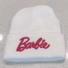 Barbie Hat Beanie New White Pink Women Size New In Package One Size Fits Most Letter Print Beanie, Letter Print Beanie Hat, Trendy Letter Print Beanie, White Letter Print Beanie, One Size Fits Most, White Letter Print Beanie (one Size Fits Most), Trendy Letter Print Beanie Hat, White Beanie With Letter Print, White Letter Print Hats For Winter, White Winter Hats With Letter Print