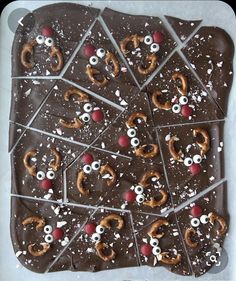 chocolate bark with pretzels and eyes on it