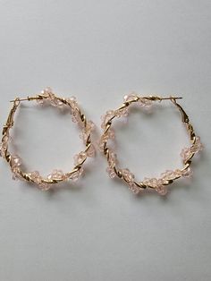 Gold light pink beaded hoop earrings. Trendy Pink Hoop Earrings With Round Beads, Pink Beaded Hoop Jewelry, Pink Hoop Beaded Earrings, Trendy Pink Round Beaded Earrings, Small Hoop Earrings With Faceted Beads, Hoop Jewelry With Faceted Beads, Elegant Party Hoop Earrings With Faceted Beads, Gold Hoop Earrings With Faceted Beads, Pink Hoop Beaded Earrings For Party