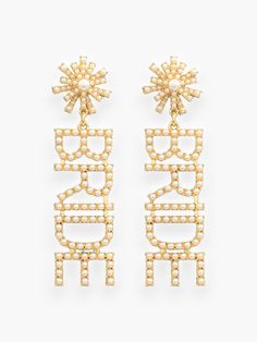 Get ready to say "I do" in style with the Gold Bride Pave Drop Earrings! These trendy gold drop earrings spell out "bride" and are perfect for adding just the right amount of charm to your bridal look. The push back closure ensures a secure and comfortable fit. These earrings are the perfect accessory for the bride-to-be who wants to add a touch of sparkle to her special day. With their elegant design and delicate pave details, these earrings will make you feel like the belle of the ball. Walk down the aisle with confidence and style in these stunning earrings. Features: Gold drop earrings with "bride" inscription for a trendy and charming look. Push back closure for a secure and comfortable fit. Delicate pave details for added sparkle. Perfect accessory to elevate your bridal look. Elegan Trendy Gold Earrings, White Bridal Shower Dress, Bridal Shower Dress, Bridal Look, Walking Down The Aisle, Stunning Earrings, Gold Drop Earrings, Bridal Looks, Bridal Style