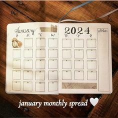 a calendar is shown on top of a wooden table with the words january, month and date