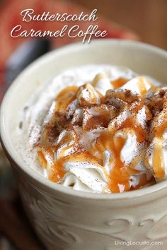 a cup filled with whipped cream and caramel