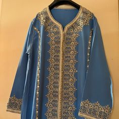 Moroccan Authentic Hand Made Caftan In A Chic Classy Blue- Comes With Belt In Gold. Size Would Fit A M/L But It’s Not Too Loose If You’re A Size Small Elegant Long Sleeve Blue Thobe, Blue Traditional Long Thobe, Blue Traditional Abaya For Eid, Traditional Blue Long Thobe, Traditional Blue Abaya For Eid, Traditional Blue Thobe For Eid, Traditional Long Blue Thobe, Elegant Embroidered Blue Thobe, Elegant Long Sleeve Light Blue Kurta