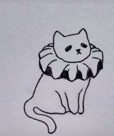 a black and white drawing of a cat