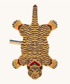 an animal rug with a tiger design on it's face and the bottom part of its body