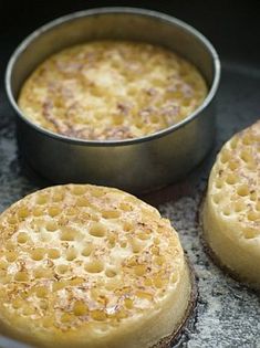 three cakes sitting on top of a metal pan