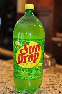 a bottle of sun drop sitting on top of a counter