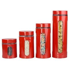 three red canisters with cereal in them