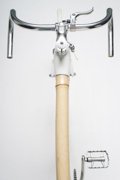 a close up of a bike handlebar with a toothbrush holder on the top