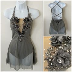 the dress is grey and has silver flowers on it, along with other images of clothing