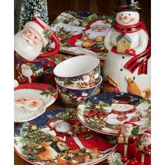 a table topped with lots of christmas themed dishes