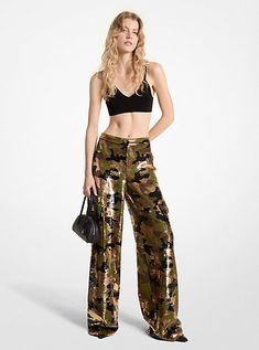 The utility-chic cargo pant gets a glamorous update. Designed in a sequined camouflage print fabric with a fitted waist and wide leg, these wide-leg pants feature classic cargo pocket styling at each side. Pair them with a crop top and heels for your next night out. Camouflage Print, Michael Kors Collection, Cargo Pocket, Cargo Pant, Gold Geometric, Denim Pant, Wide Leg Trousers, Print Fabric, Bottoms Pants