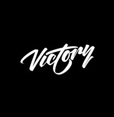 the word victory written in white ink on a black background