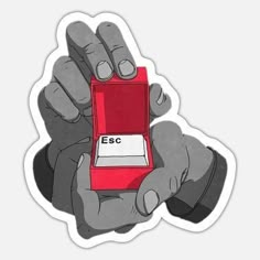 a hand holding an electronic device with the word esc on it