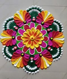 a colorful flower design is on the floor