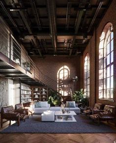 a living room filled with lots of furniture next to tall windows and bookshelves