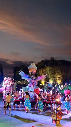 a group of people dressed in colorful costumes