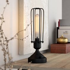 a table lamp sitting on top of a wooden shelf