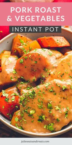 pork roast and vegetables with gravy in a white bowl