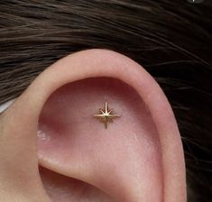 an ear with a tiny star on it