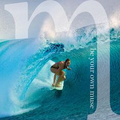 a man riding a wave on top of a surfboard in the ocean with words below him