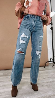 Step back into the '90s with the High Rise Denim Jeans from KANCAN, a perfect blend of vintage vibes and modern comfort. These jeans capture the essence of retro cool with their high rise and relaxed, rigid fit. 12" Rise / 32" Inseam (in size 5/26) Hidden 5-button closure 100% Cotton Stretchiness Level >> Rigid - minimal stretch We recommend sizing up one size in this style denim 90s Denim High rise Trendy denim Model Specs: Emily is wearing a size 5 in the photo.How will this item fit you? Chec Style Wide Leg Jeans, High Rise Denim Jeans, Trendy Denim, Modern Vintage Fashion, 90s Denim, Jeans Shirt, Exclusive Dress, Everyday Chic, High Rise Denim