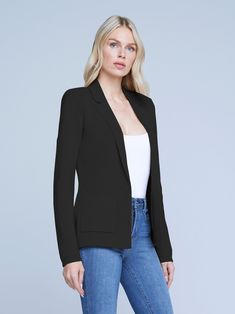 An effortlessly chic knit blazer in black. Classic tailored details like lapels and patch pockets complement soft, luxurious knit done in a lightly textured stitch. Clean silhouette tapers at waist for a flatteringly sleek fit. Tonal embossed-dome button closure. Elegant Single Breasted Cardigan For Business Casual, Elegant Lapel Collar Cardigan For Work, Elegant Cardigan With Lapel Collar For Workwear, Elegant Lapel Collar Cardigan For Office, Elegant Single Breasted Cardigan For Office, Elegant Tailored Cardigan With Lapel Collar, Black V-neck Business Casual Outerwear, Black V-neck Outerwear For Business Casual, Chic Formal Single Breasted Cardigan