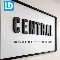 a sign that says central on it in black and white