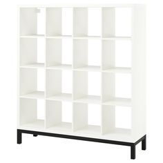 a white bookcase with black legs and shelves