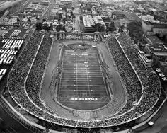 an aerial view of a football stadium in the 1950's or early 1960s's