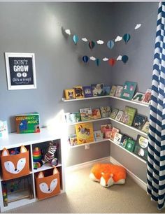 a child's room with bookshelves and toys