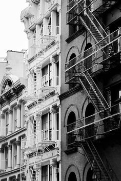 an old building with many balconies and fire escapes