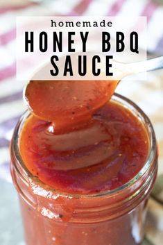 homemade honey bbq sauce in a mason jar with a spoon sticking out of it