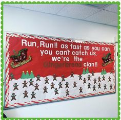 a bulletin board with gingerbreads and santa's sleigh on it